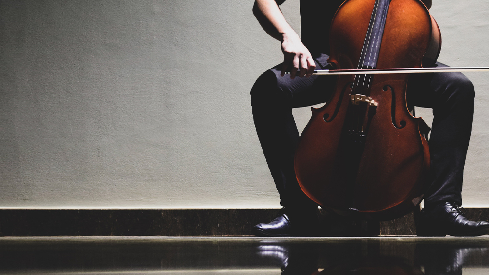 hand playing a guitar