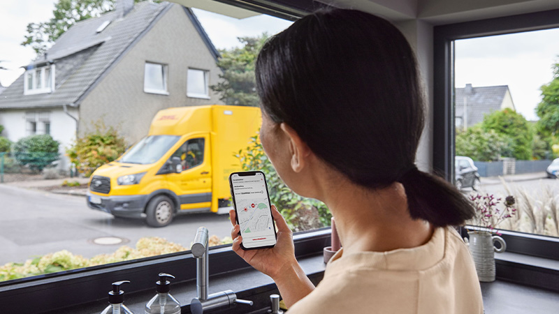 woman tracking parcel on a mobile phone