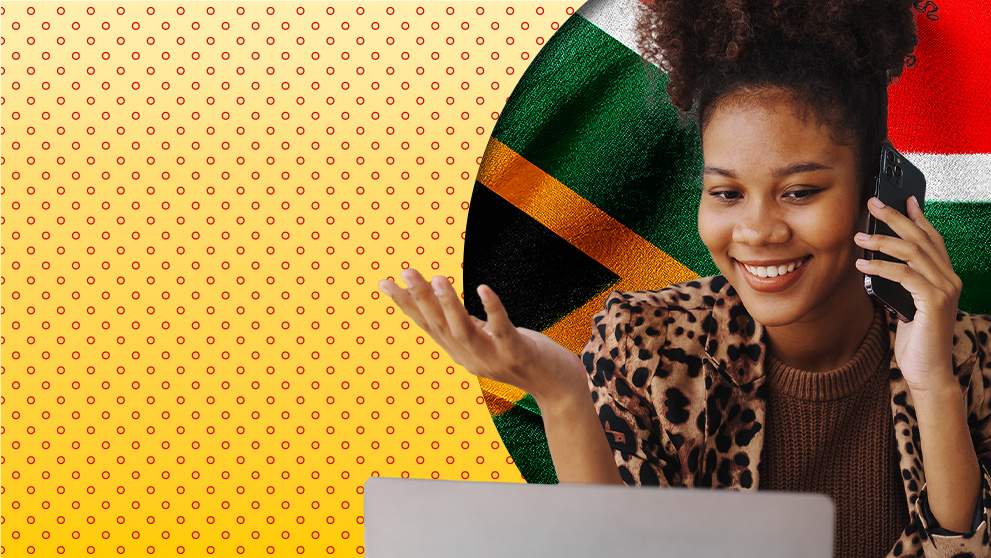 woman smiling at laptop screen