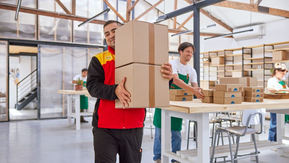 dhl employee delivering an order to an overseas customer