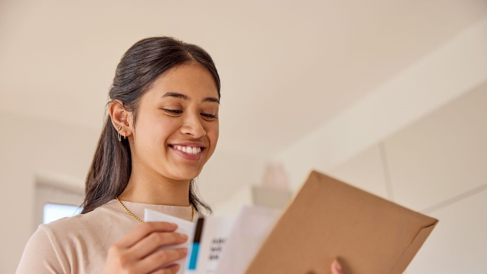 female business owner preparing documents for shipment declaration