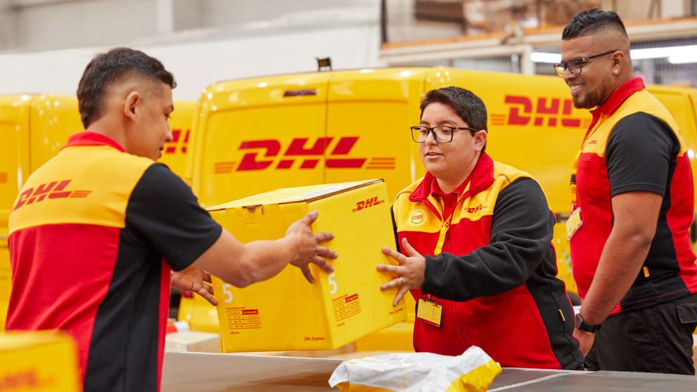 dhl express employees in myanmar handling natural resources exports