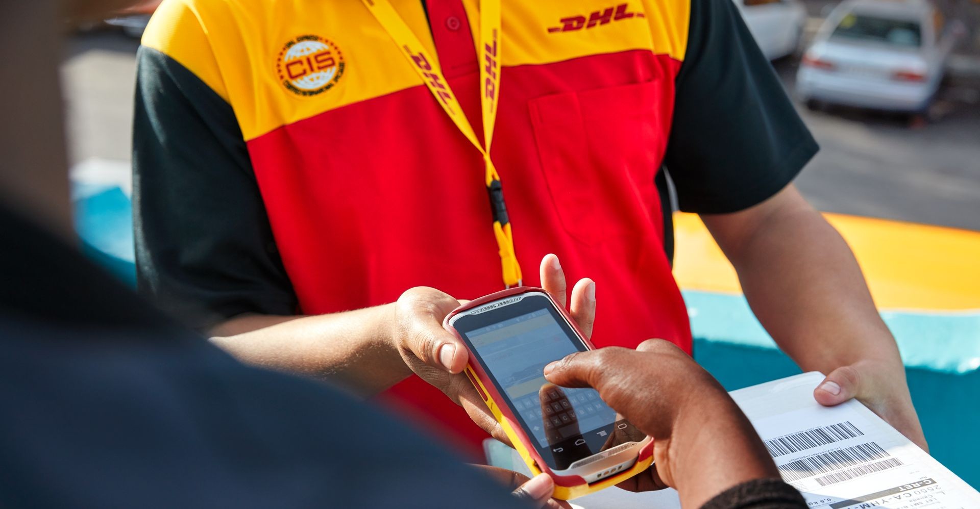 A DHL personnel  engaging in their paperless trade services
