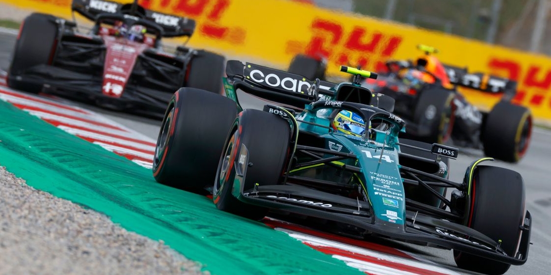 formula 1 cars on racetrack