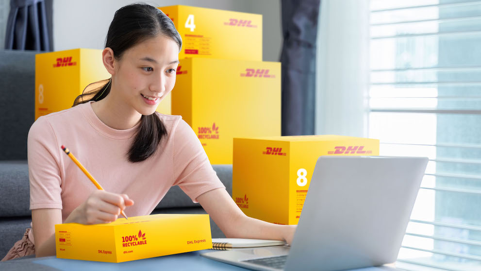 Attractive asian young teenage start up running small business owner preparing parcel boxes for deliver to customer. Home business concept; Shutterstock ID 1524837452; Purchase Order: -