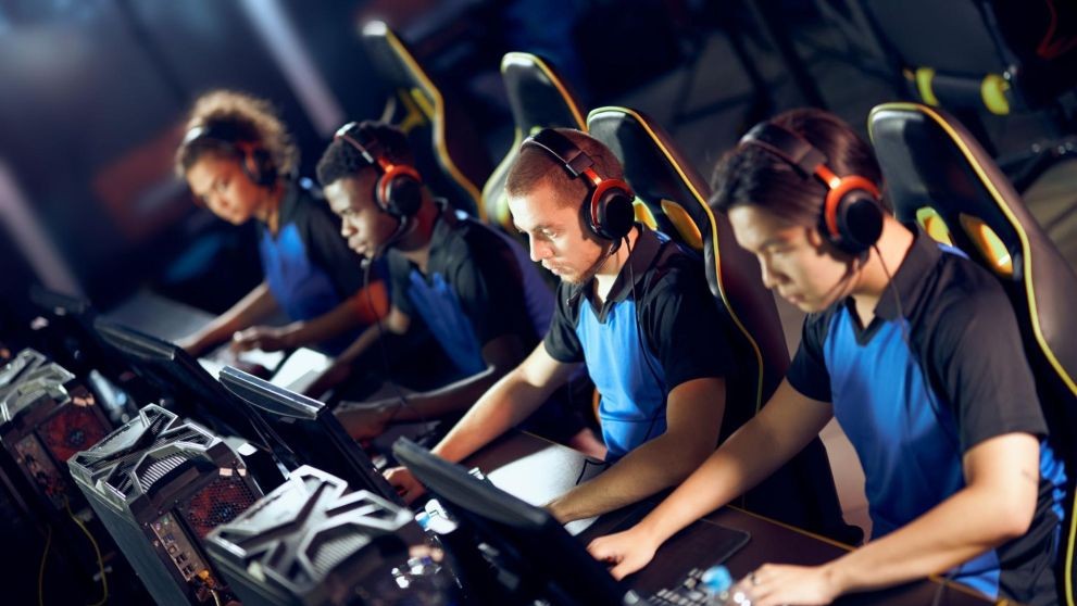 a team of focused gaming professionals at an esports events