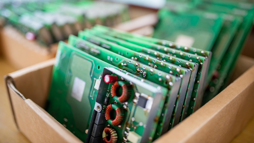 stacks of taiwan's pcbs in a cardboard package for shipping