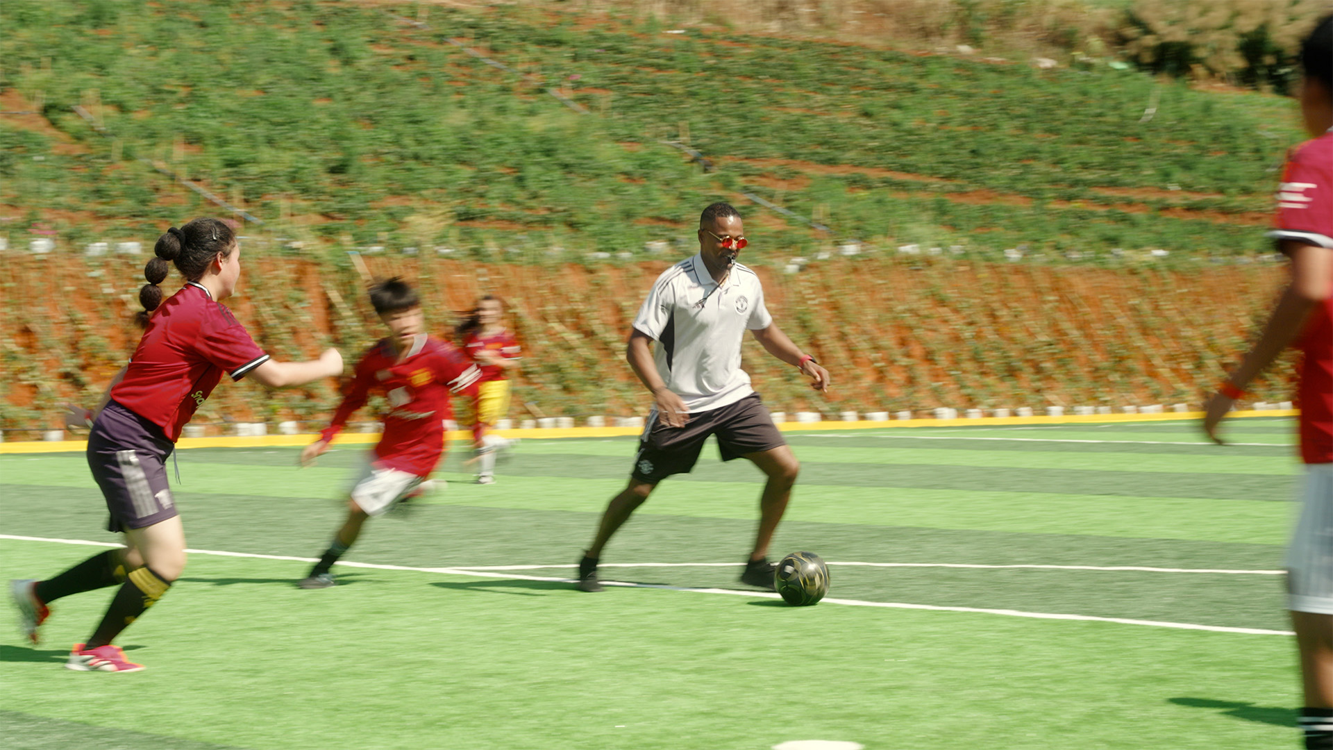 Evra with Community Football
