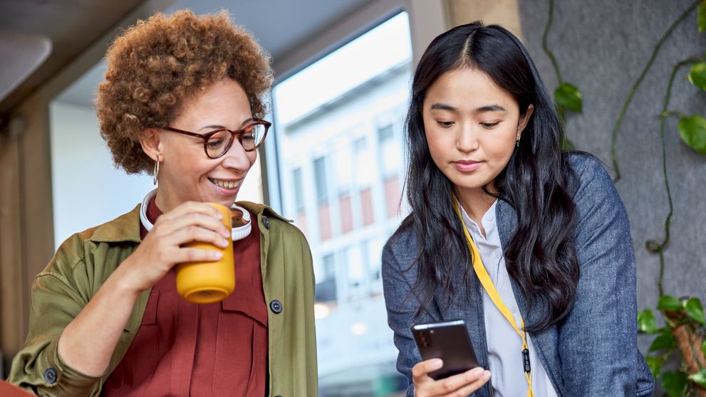 two female business owners discussing shipping goods from thailand to europe