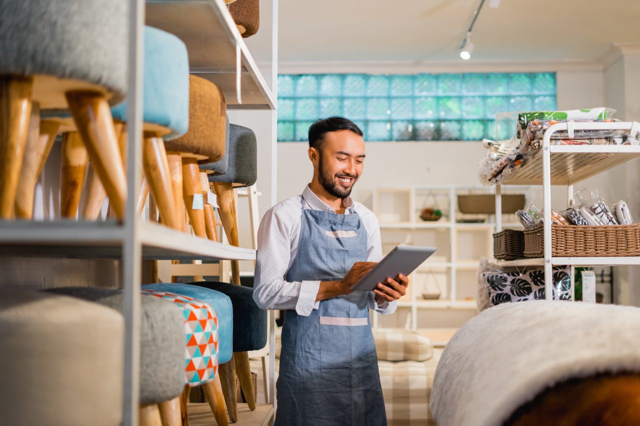 Small business owner going over stock