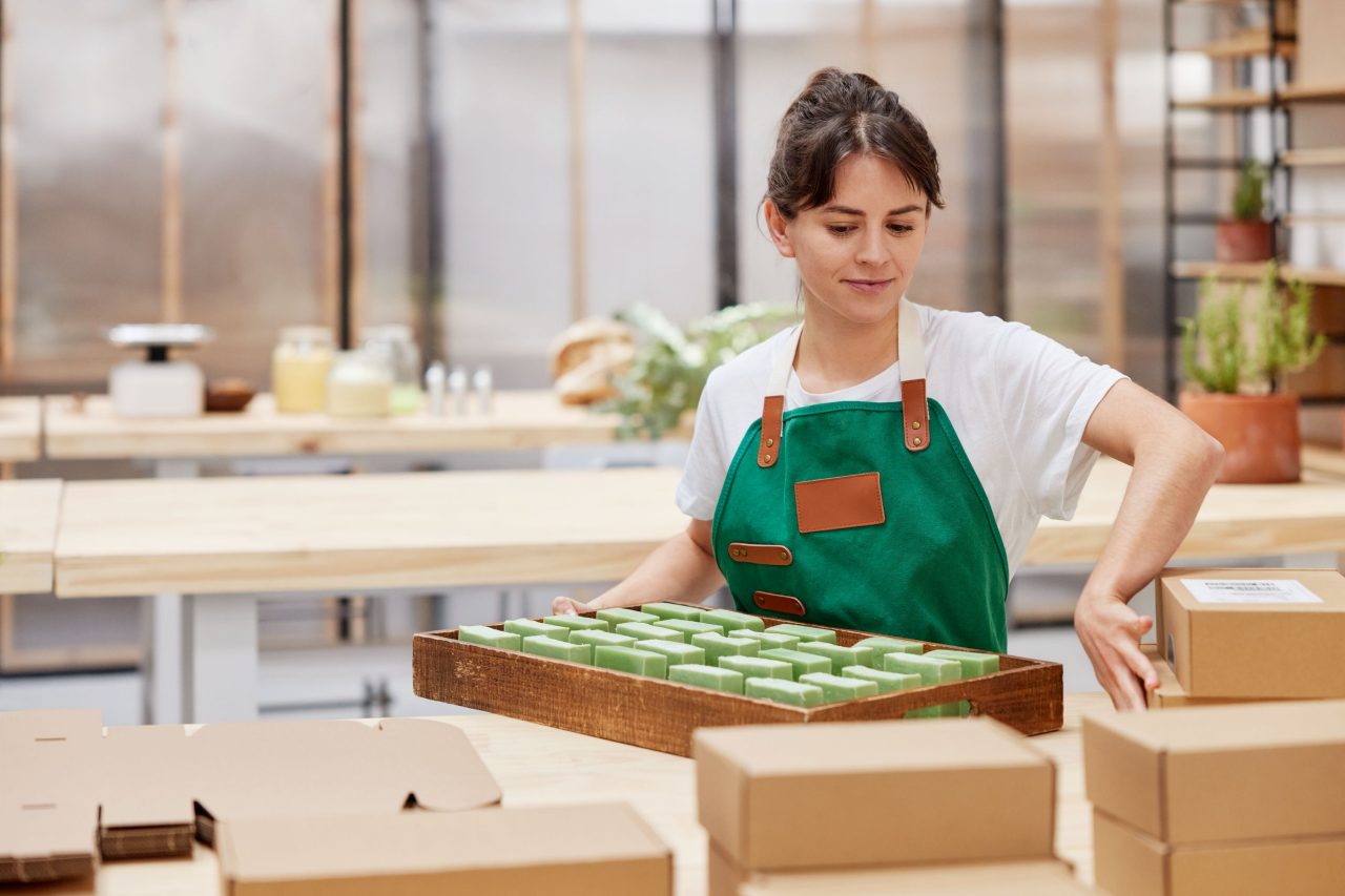 Woman packing soap bars