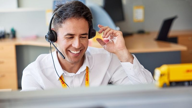 dhl express staff checking import duties and taxes of client in indonesia