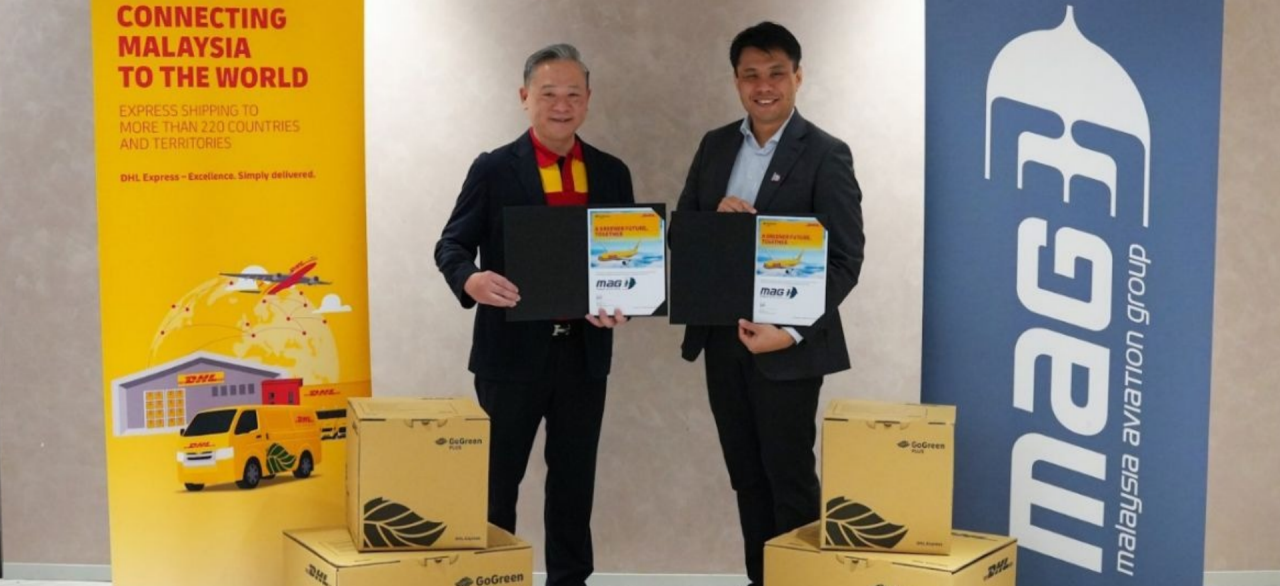 Julian Neo, Managing Director of DHL Express Malaysia and Brunei on the left and Philip See, Group Chief Sustainability Officer, Malaysia Aviation Group (MAG) on the right.