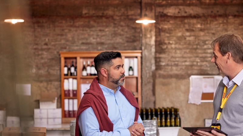 dhl express consultant advises a wine shop owner on how to properly wrap fragile items for shipping
