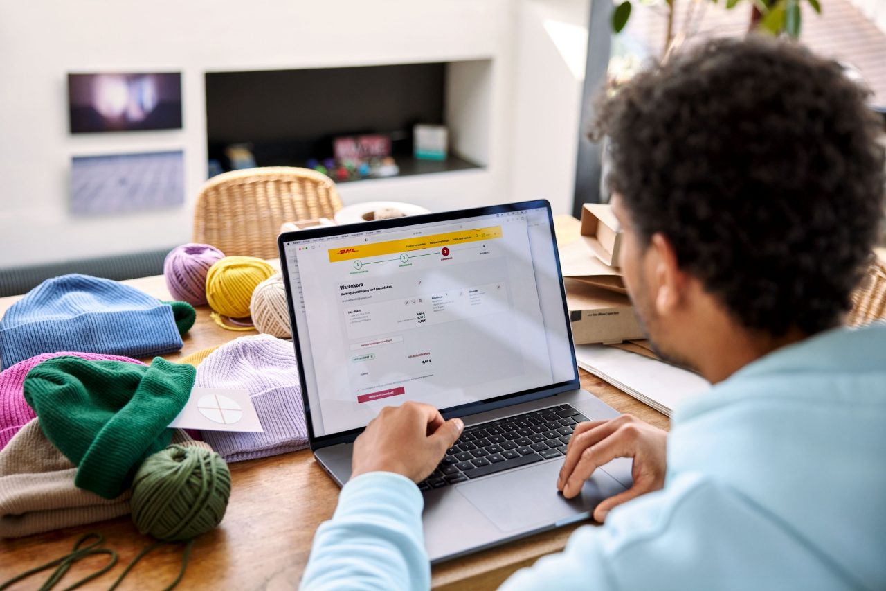 A small business owner creates a shipment online.