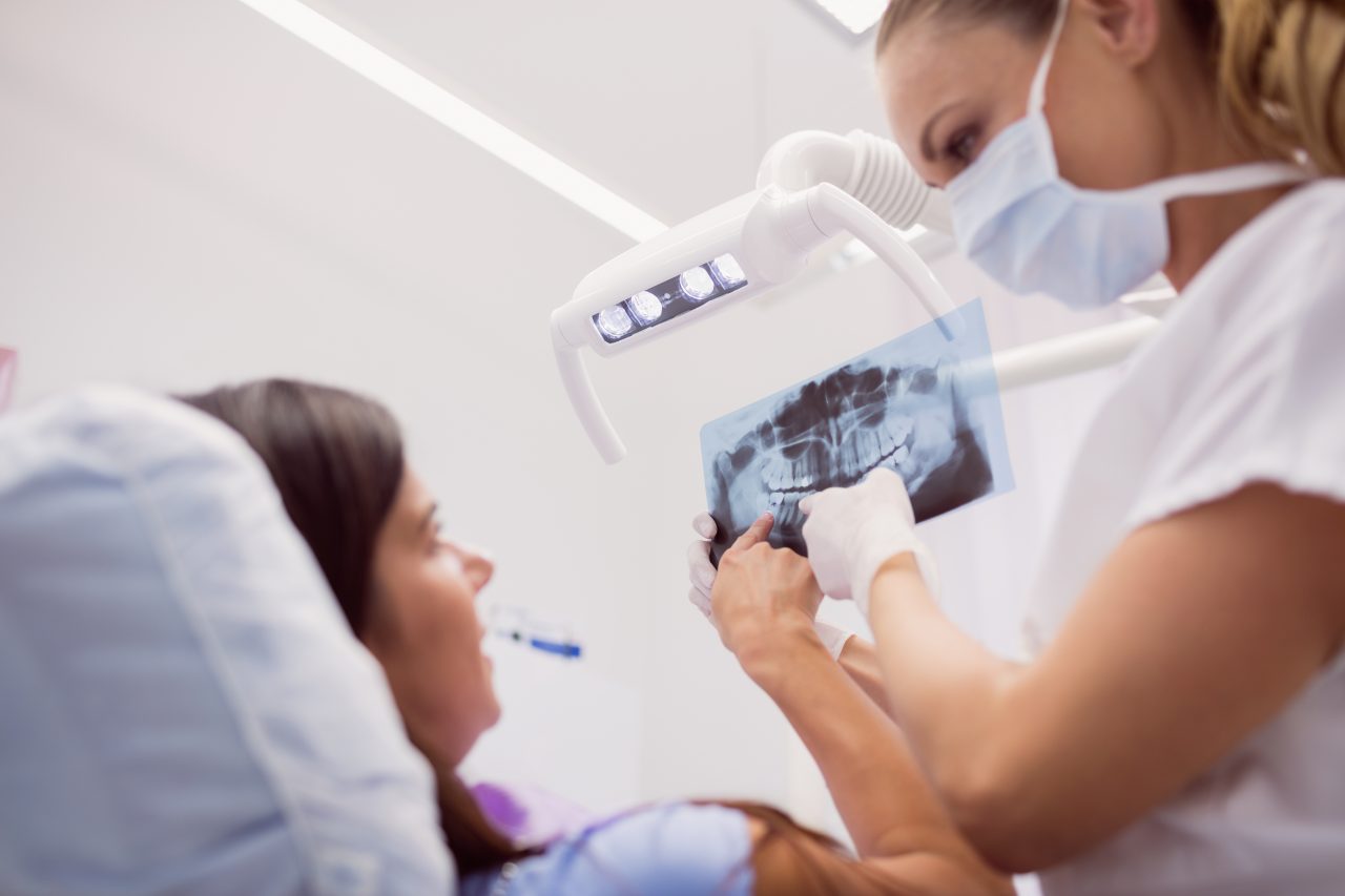 doctor and patient in a dentist 