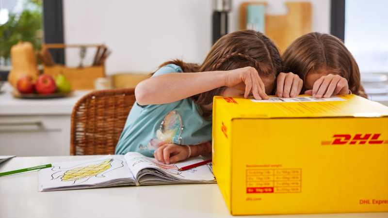 children opening delivery package